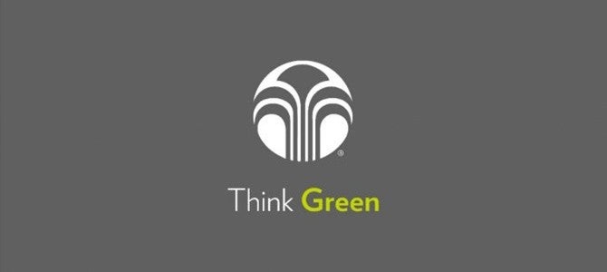 Nu Skin logo with "Think Green" text on dark grey background