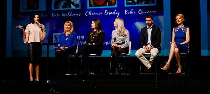 A panel sits on stage and answers questions from Nu Skin distributors and customers during the Nu Skin LIVE! Launch sessions.