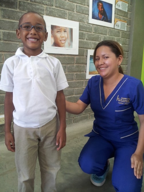 Colombian elementary school child with his new eye glasses