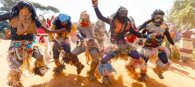 Malawi locals celebrate by dancing to traditional Malawian songs.