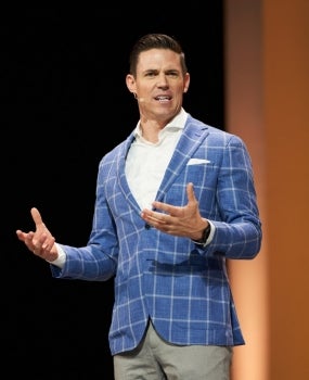 Ryan Napierski speaking at the 2018 Nu Skin Americas Convention.