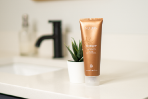 bottle of Sunright Insta Glow sunless tanner by Nu Skin
