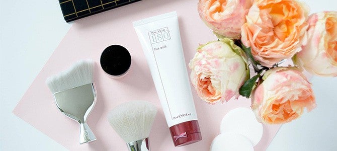 Nu Skin 180 Face Wash with flowers and makeup brushes