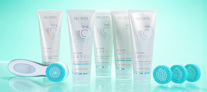 ageloc lumispa facial cleansing device by Nu Skin with treatment heads and cleansers