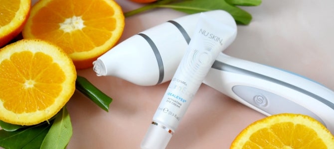 ageloc lumispa accent with idealseyes activating eye cream with sliced oranges