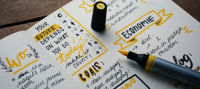 goal journal with yellow highlighter