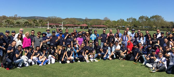 Nu Skin sales leaders and Nu Skin management pose for a picture at the Santa Maria Polo Club.